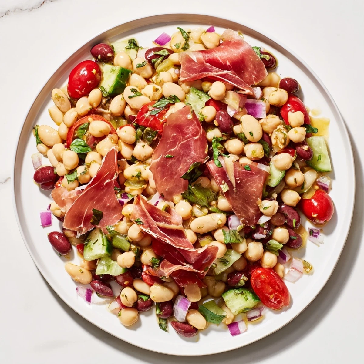 Chilled Dense Bean Salad with Prosciutto: a refreshing Italian salad with beans, vegetables, and salty prosciutto.