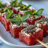Watermelon Feta Mint Skewers: Refreshing summer bites with juicy watermelon, creamy feta, and aromatic mint.