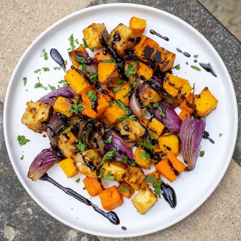 Sizzling Roasted Root Vegetable Medley with balsamic glaze: a colorful, savory vegetarian side dish.