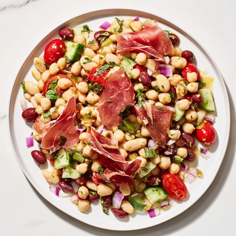 Chilled Dense Bean Salad with Prosciutto: a refreshing Italian salad with beans, vegetables, and salty prosciutto.