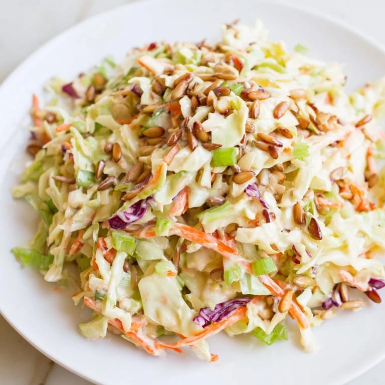 Enjoy a big bowl of this classic American Crunchy Coleslaw Salad, ideal for a summer barbecue.