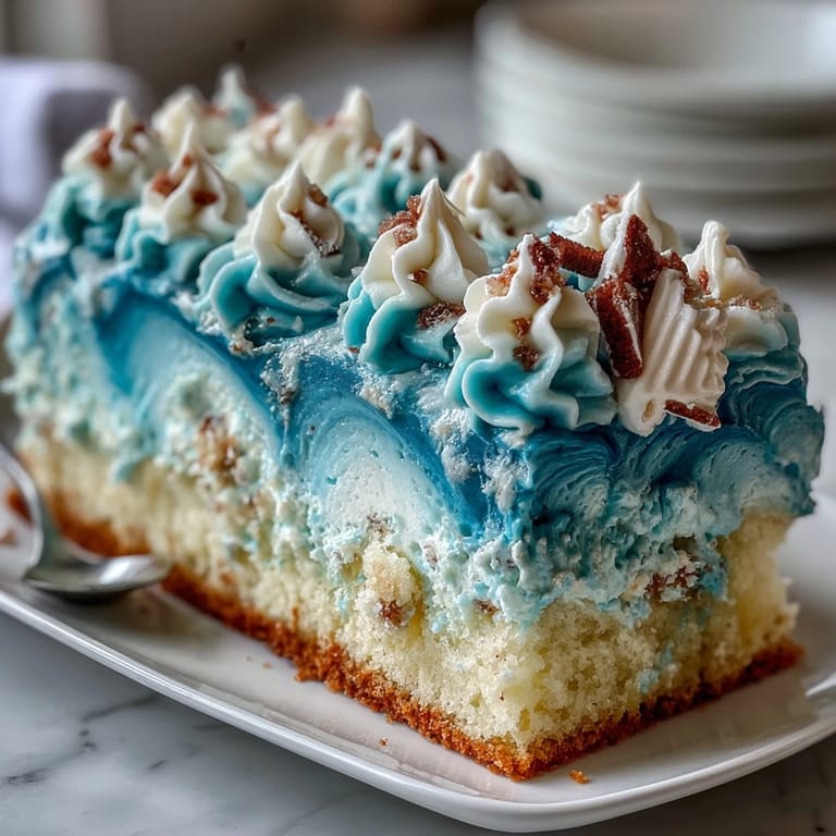 Whimsical Pisces Cake Sheet Cake with ocean wave piping, featuring moist vanilla sponge, edible pearls, and vibrant blue buttercream for an aquatic masterpiece.